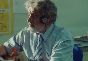 Movie still from “Stromae - Santé” (2021), directed by Jara Moravec – Close Up shot, Over the shoulder angle