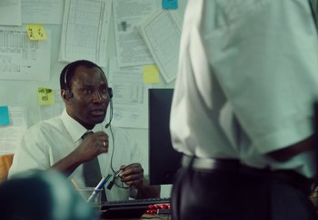 Movie still from “Stromae - Santé” (2021), directed by Jara Moravec – Medium shot, Over the shoulder angle