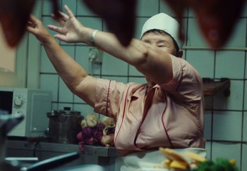 Movie still from “Stromae - Santé” (2021), directed by Jara Moravec – Medium shot, Low angle