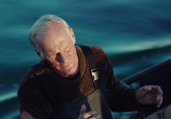 Movie still from “Stromae - Santé” (2021), directed by Jara Moravec – Close Up shot, High angle