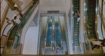 Movie still from “24kGoldn & Lil Tecca - Prada” (2021), directed by John Tashiro – Extreme Wide shot, Overhead angle