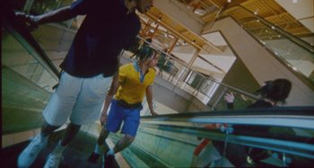 Movie still from “24kGoldn & Lil Tecca - Prada” (2021), directed by John Tashiro – Wide shot, Overhead angle