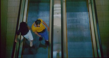 Movie still from “24kGoldn & Lil Tecca - Prada” (2021), directed by John Tashiro – Wide shot, Overhead angle