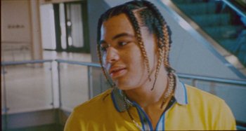 Movie still from “24kGoldn & Lil Tecca - Prada” (2021), directed by John Tashiro – Close Up shot, Low angle