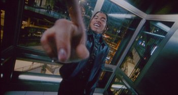 Movie still from “24kGoldn & Lil Tecca - Prada” (2021), directed by John Tashiro – Extreme Close Up shot, Overhead angle