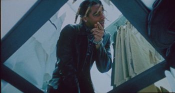 Movie still from “24kGoldn & Lil Tecca - Prada” (2021), directed by John Tashiro – Medium shot, Low angle