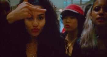 Movie still from “24kGoldn & Lil Tecca - Prada” (2021), directed by John Tashiro – Extreme Close Up shot, High angle