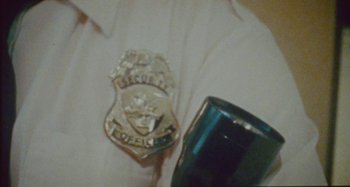 Movie still from “24kGoldn & Lil Tecca - Prada” (2021), directed by John Tashiro – Extreme Close Up shot, Overhead angle