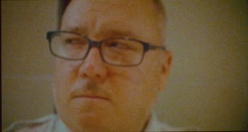 Movie still from “24kGoldn & Lil Tecca - Prada” (2021), directed by John Tashiro – Extreme Close Up shot, High angle