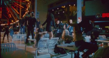 Movie still from “24kGoldn & Lil Tecca - Prada” (2021), directed by John Tashiro – Wide shot, High angle