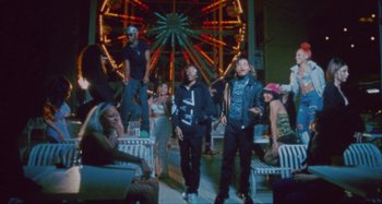 Movie still from “24kGoldn & Lil Tecca - Prada” (2021), directed by John Tashiro – Wide shot, Low angle