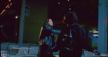 Movie still from “24kGoldn & Lil Tecca - Prada” (2021), directed by John Tashiro – Medium shot, Low angle