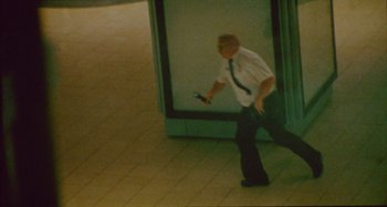 Movie still from “24kGoldn & Lil Tecca - Prada” (2021), directed by John Tashiro – Medium shot, High angle