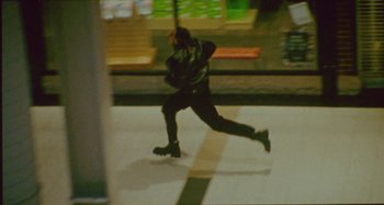 Movie still from “24kGoldn & Lil Tecca - Prada” (2021), directed by John Tashiro – Wide shot, High angle