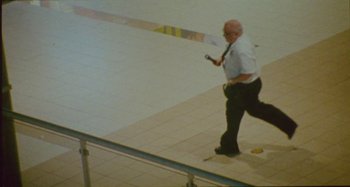 Movie still from “24kGoldn & Lil Tecca - Prada” (2021), directed by John Tashiro – Wide shot, High angle