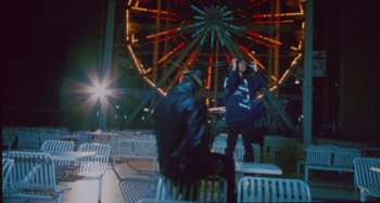 Movie still from “24kGoldn & Lil Tecca - Prada” (2021), directed by John Tashiro – Wide shot, High angle