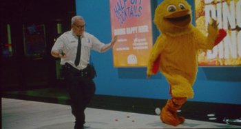 Movie still from “24kGoldn & Lil Tecca - Prada” (2021), directed by John Tashiro – Wide shot, Low angle