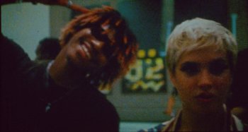 Movie still from “24kGoldn & Lil Tecca - Prada” (2021), directed by John Tashiro – Close Up shot, Low angle