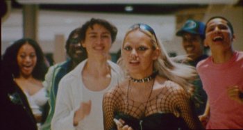 Movie still from “24kGoldn & Lil Tecca - Prada” (2021), directed by John Tashiro – Medium shot, High angle