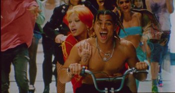 Movie still from “24kGoldn & Lil Tecca - Prada” (2021), directed by John Tashiro – Medium shot, High angle