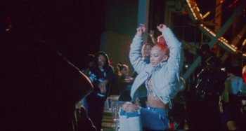 Movie still from “24kGoldn & Lil Tecca - Prada” (2021), directed by John Tashiro – Medium shot, High angle