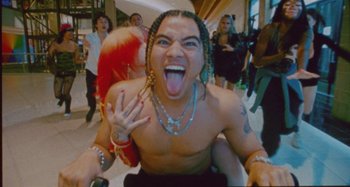 Movie still from “24kGoldn & Lil Tecca - Prada” (2021), directed by John Tashiro – Medium shot, High angle