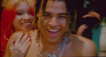 Movie still from “24kGoldn & Lil Tecca - Prada” (2021), directed by John Tashiro – Extreme Close Up shot, High angle