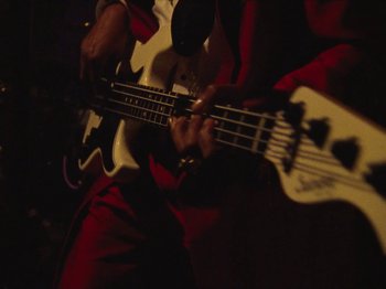 Movie still from “Earth, Wind & Fire - You Want My Love” (2021), directed by Andrew Litten – Extreme Close Up shot, Low angle