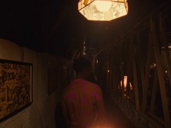 Movie still from “Earth, Wind & Fire - You Want My Love” (2021), directed by Andrew Litten – Medium shot, High angle