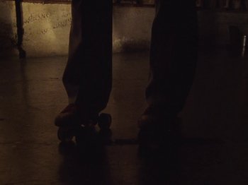 Movie still from “Earth, Wind & Fire - You Want My Love” (2021), directed by Andrew Litten – Extreme Close Up shot, Low angle
