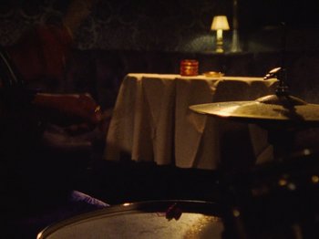 Movie still from “Earth, Wind & Fire - You Want My Love” (2021), directed by Andrew Litten – Extreme Close Up shot, High angle