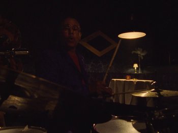 Movie still from “Earth, Wind & Fire - You Want My Love” (2021), directed by Andrew Litten – Medium shot, Low angle