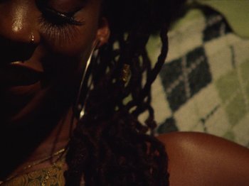 Movie still from “Earth, Wind & Fire - You Want My Love” (2021), directed by Andrew Litten – Extreme Close Up shot, Low angle