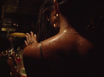 Movie still from “Earth, Wind & Fire - You Want My Love” (2021), directed by Andrew Litten – Extreme Close Up shot, Over the shoulder angle