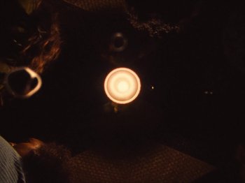 Movie still from “Earth, Wind & Fire - You Want My Love” (2021), directed by Andrew Litten – Extreme Close Up shot, Overhead angle