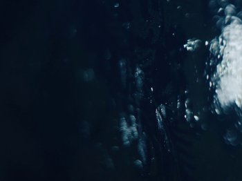 Movie still from “Earth, Wind & Fire - You Want My Love” (2021), directed by Andrew Litten – Extreme Close Up shot, Overhead angle