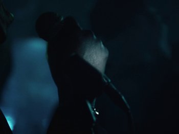 Movie still from “Earth, Wind & Fire - You Want My Love” (2021), directed by Andrew Litten – Extreme Close Up shot, Low angle