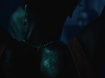 Movie still from “Earth, Wind & Fire - You Want My Love” (2021), directed by Andrew Litten – Extreme Close Up shot, High angle