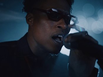Movie still from “Earth, Wind & Fire - You Want My Love” (2021), directed by Andrew Litten – Extreme Close Up shot, Low angle