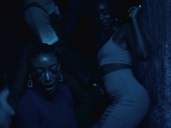 Movie still from “Earth, Wind & Fire - You Want My Love” (2021), directed by Andrew Litten – Medium shot, Low angle