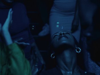 Movie still from “Earth, Wind & Fire - You Want My Love” (2021), directed by Andrew Litten – Close Up shot, Low angle