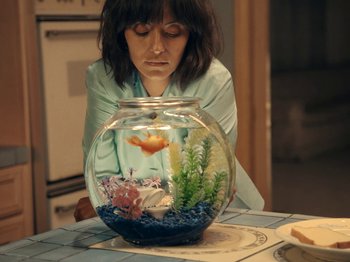 Movie still from “Blue Wilson - Underwater Dance” (2021), directed by Gabriel Jace Long – Medium shot, High angle