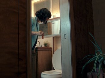 Movie still from “Blue Wilson - Underwater Dance” (2021), directed by Gabriel Jace Long – Medium shot, Low angle