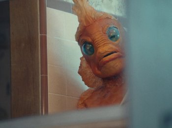 Movie still from “Blue Wilson - Underwater Dance” (2021), directed by Gabriel Jace Long – Extreme Close Up shot, Over the shoulder angle