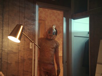 Movie still from “Blue Wilson - Underwater Dance” (2021), directed by Gabriel Jace Long – Medium shot, High angle