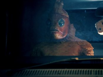 Movie still from “Blue Wilson - Underwater Dance” (2021), directed by Gabriel Jace Long – Close Up shot, High angle