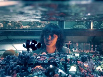 Movie still from “Blue Wilson - Underwater Dance” (2021), directed by Gabriel Jace Long – Medium shot, High angle