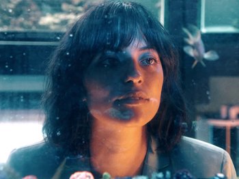 Movie still from “Blue Wilson - Underwater Dance” (2021), directed by Gabriel Jace Long – Close Up shot, High angle