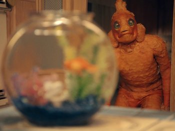 Movie still from “Blue Wilson - Underwater Dance” (2021), directed by Gabriel Jace Long – Medium shot, High angle