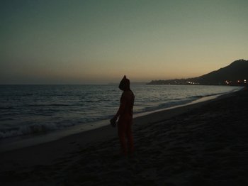 Movie still from “Blue Wilson - Underwater Dance” (2021), directed by Gabriel Jace Long – Extreme Wide shot, High angle